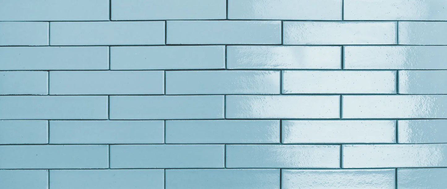 Ladrillo esmaltado azul turquesa Larimar para fachada mediterránea