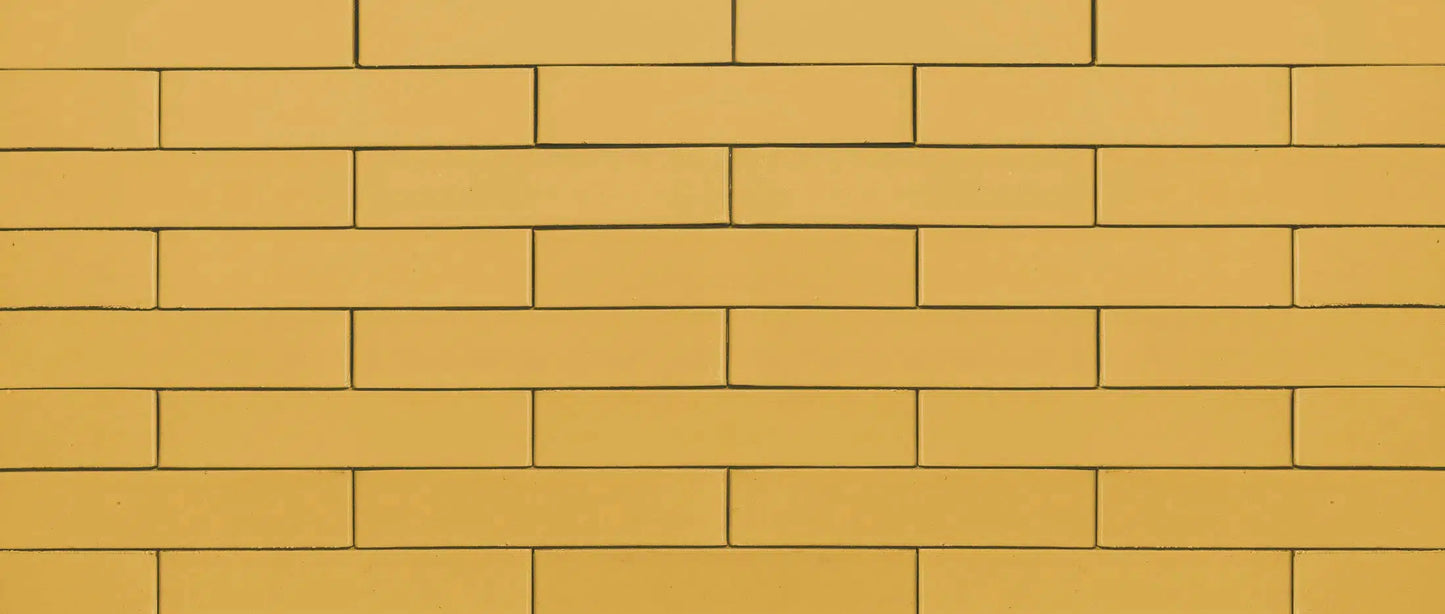 Ladrillo esmaltado amarillo Albero para fachada y decoración exterior