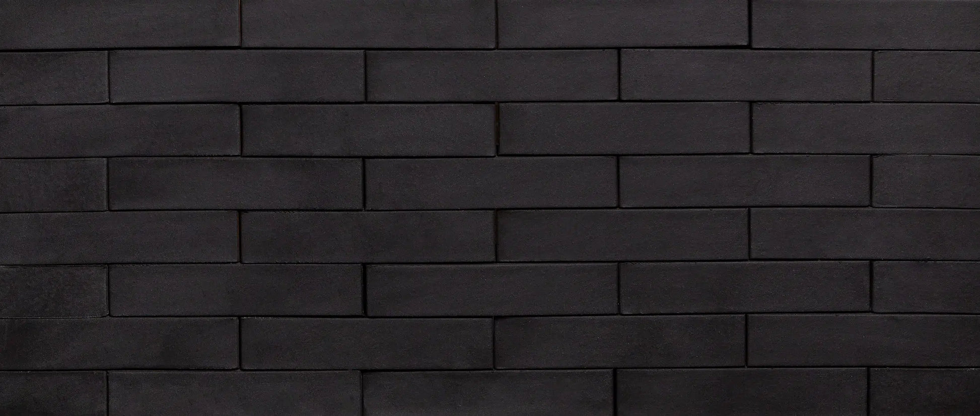Ladrillo klinker negro Arrecife para fachada oscura contemporánea