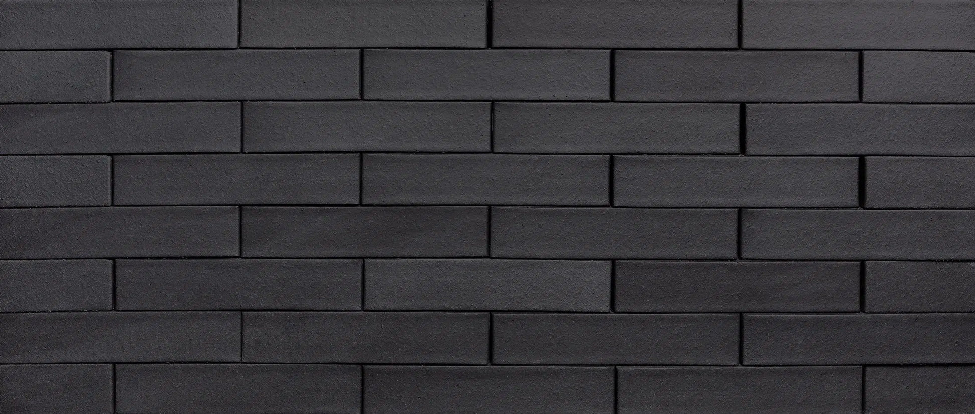 Ladrillo klinker negro Lanzarote para fachada industrial exterior